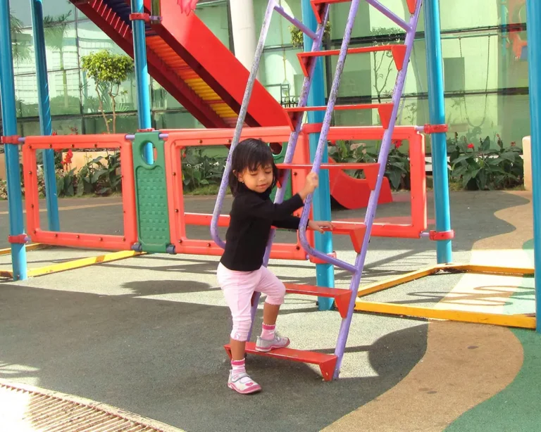 kid-playing-in-playground-at-daycare-in-bellevue